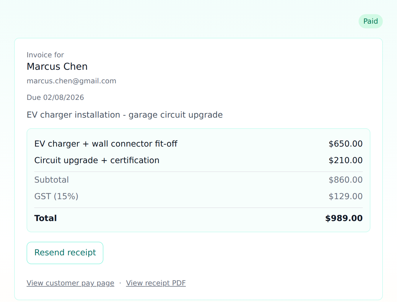 The invoice detail page showing a Paid status badge